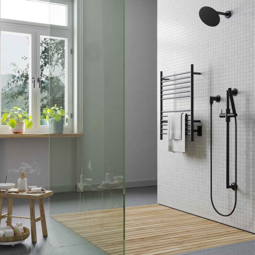 Smart towel warmer on wall in a shower.