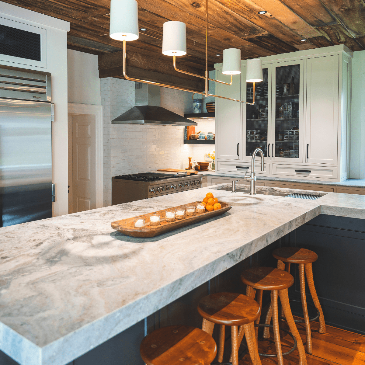 Rustic kitchen with light gray countertops.
