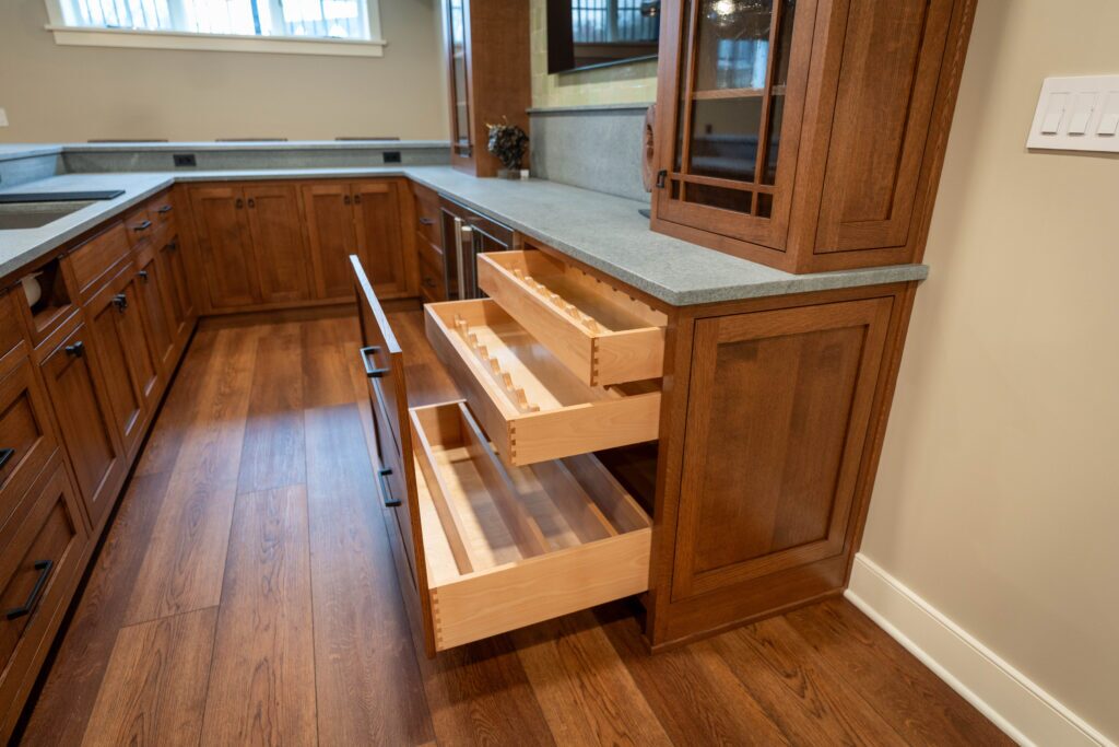 Brown drawers open to show storage.