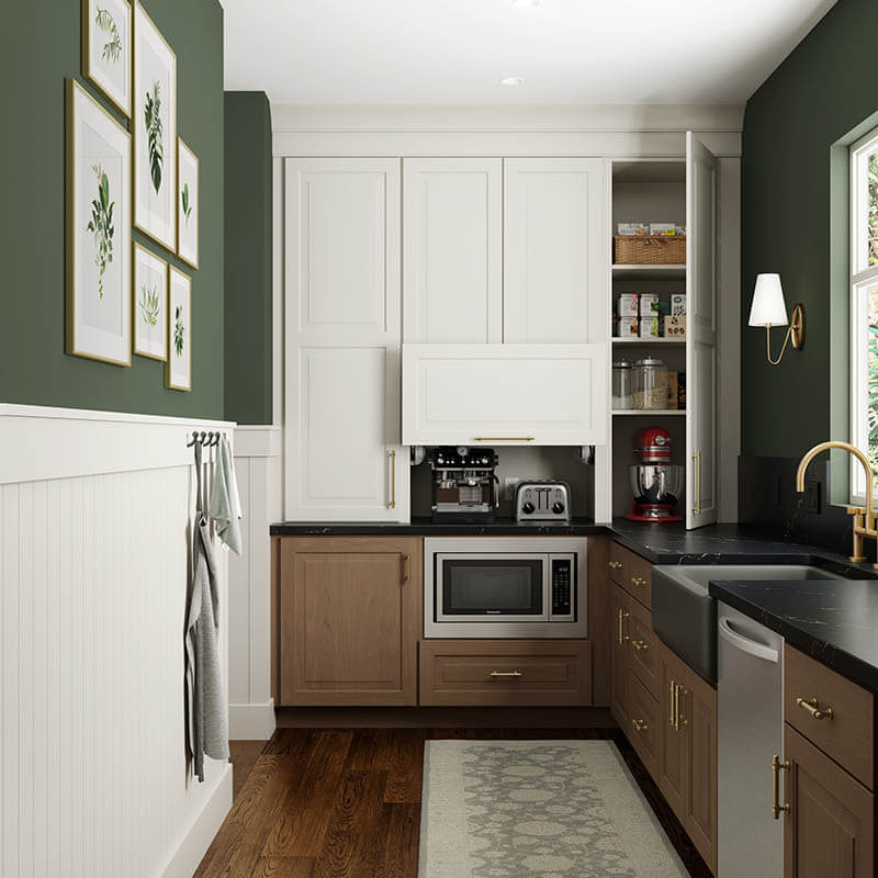 modern farmhouse kitchen with a sage color green wall paint and white and natural wood color cabinets