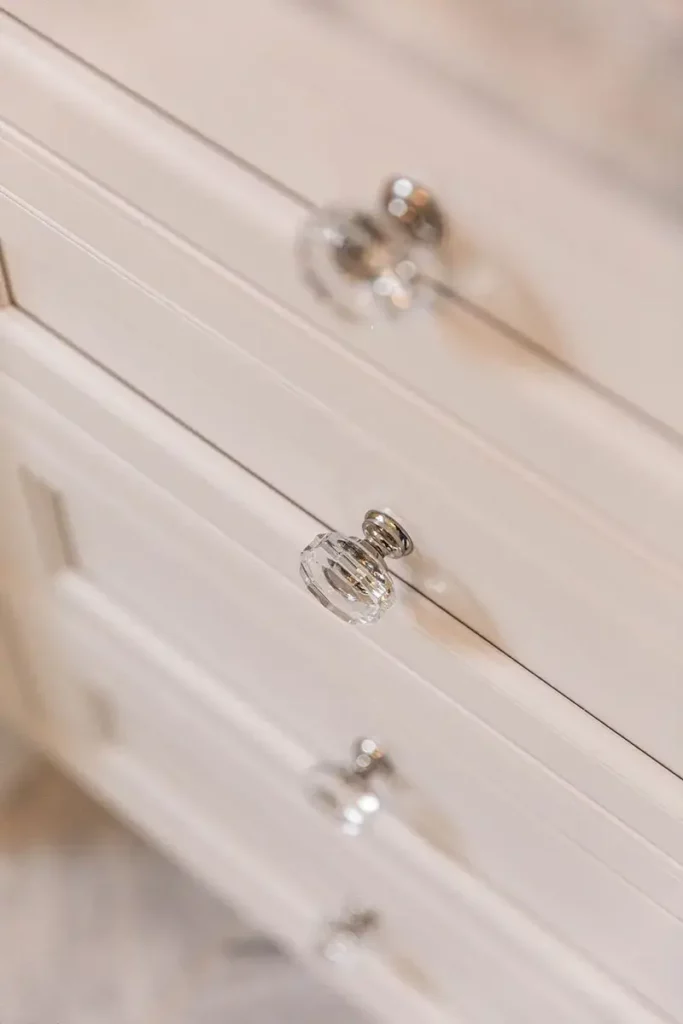 White custom cabinet drawers with crystal handle pulls
