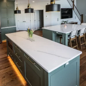 Green kitchen island for a custom kitchen remodel in Easton, PA, by Laslo Custom Kitchens.