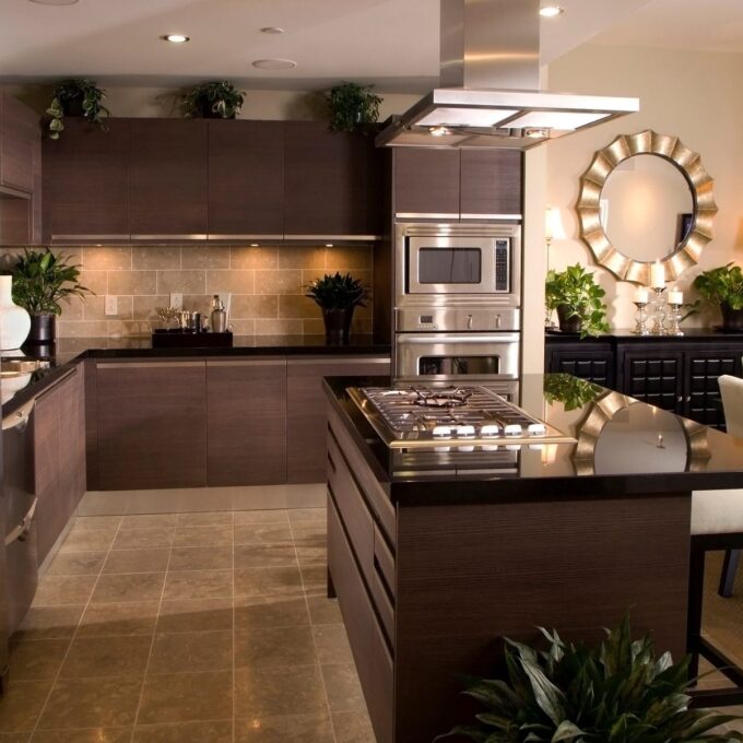 kitchen remodel ideas 2025 picture of a brown kitchen with dark countertops