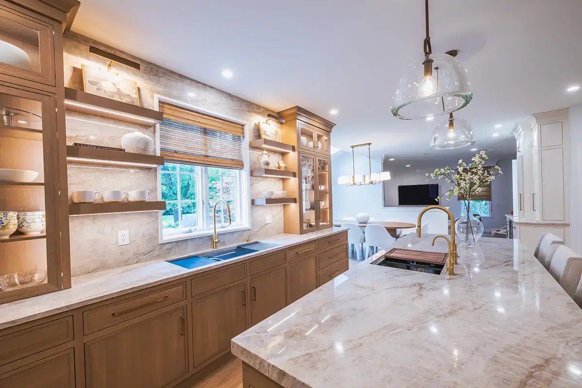 Kitchen remodel for a kosher kitchen showing integrated lighting and high end appliances