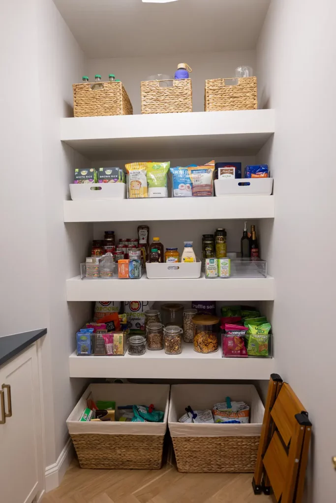 the pantry finished in Cloud Cover paint and Silestone Quartz Charcoal Soapstone counters