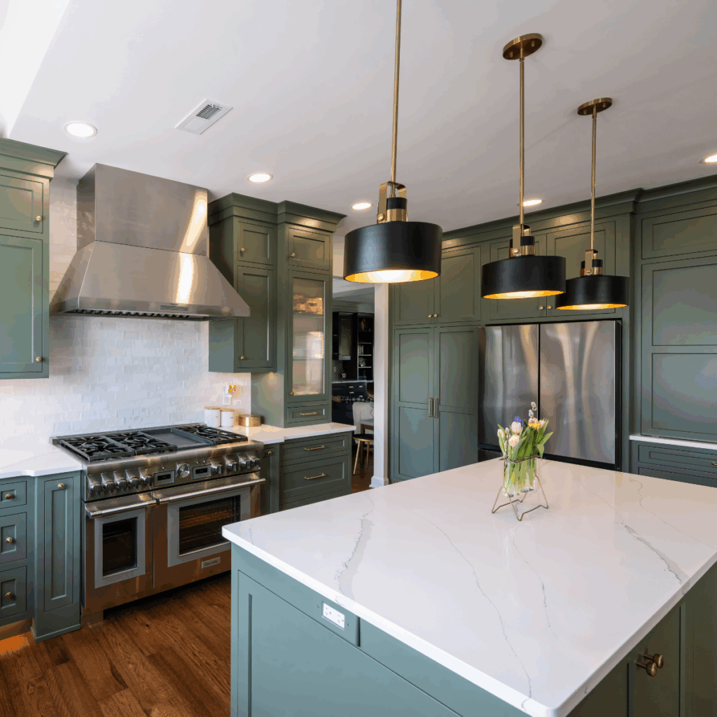 Green kitchen cabinets by Laslo Custom Kitchens.