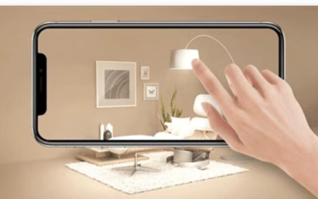Finger pointing at a light through a smartphone
