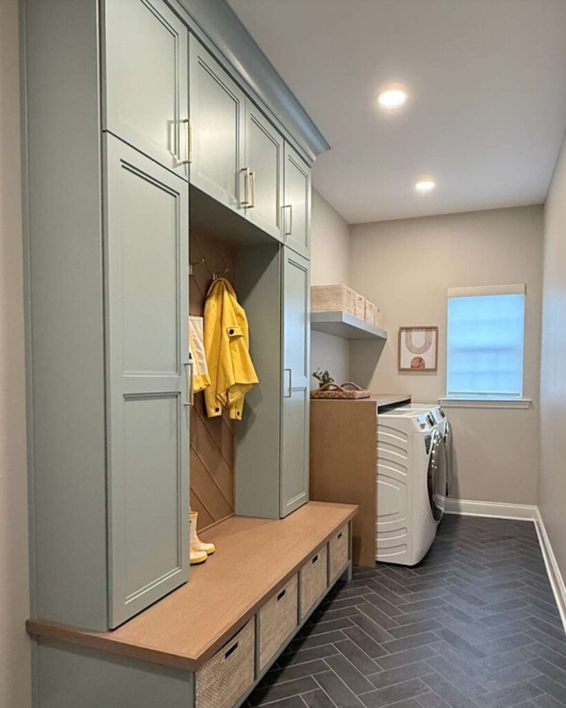 Sage cabinets in laundry room.