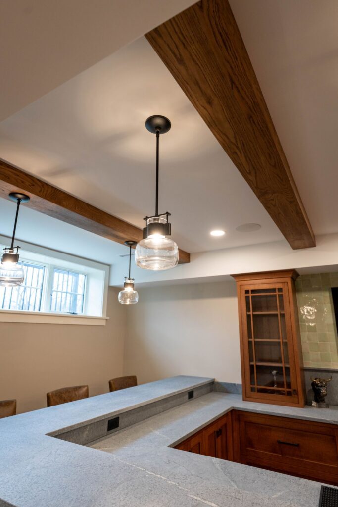 vintage style pendant lighting over soapstone counter