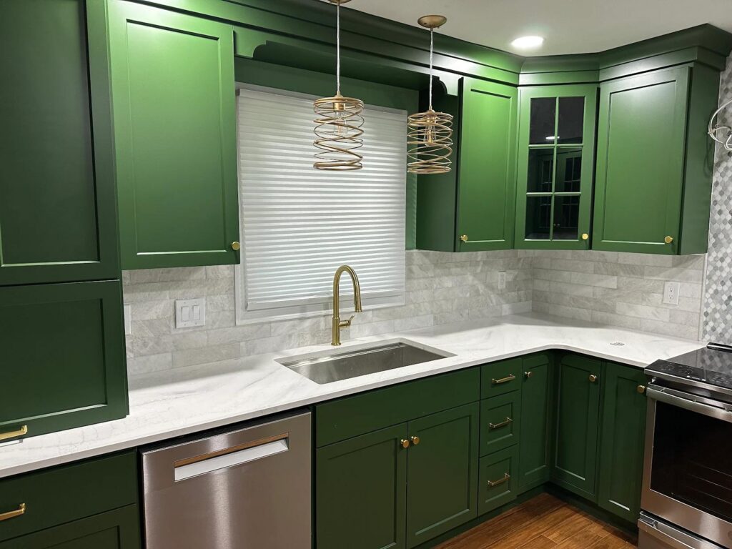 Kitchen remodel Lehigh Valley PA featuring green custom cabinets with brass hardware and full overlay design by Laslo custom kitchens