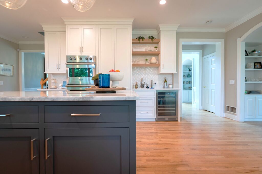 White rift cut oak floating shelves in custom kitchen design Center Valley PA with natural wood accents