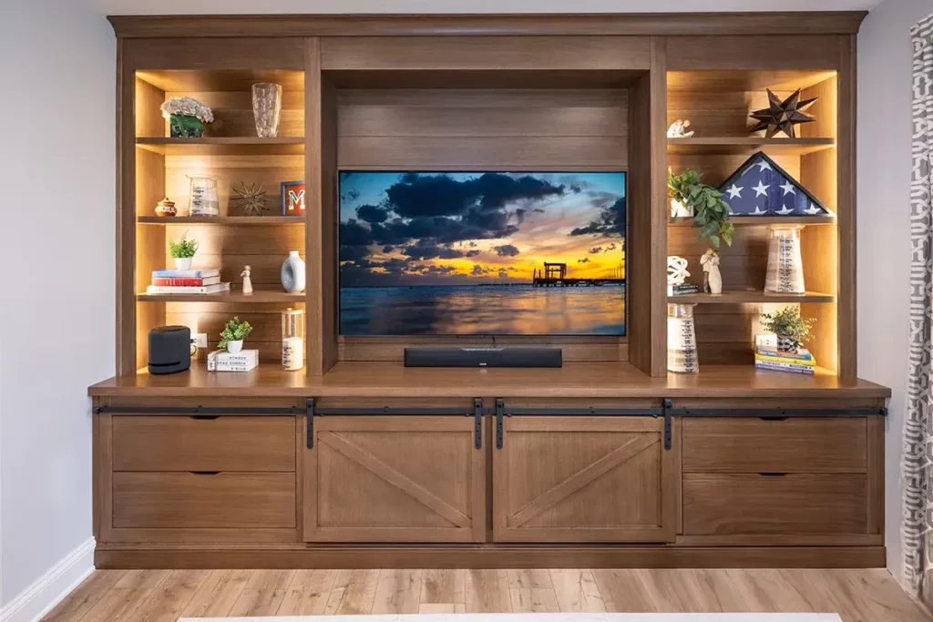 A custom entertainment center that showcases Laslo's ability to add custom lighting to their work