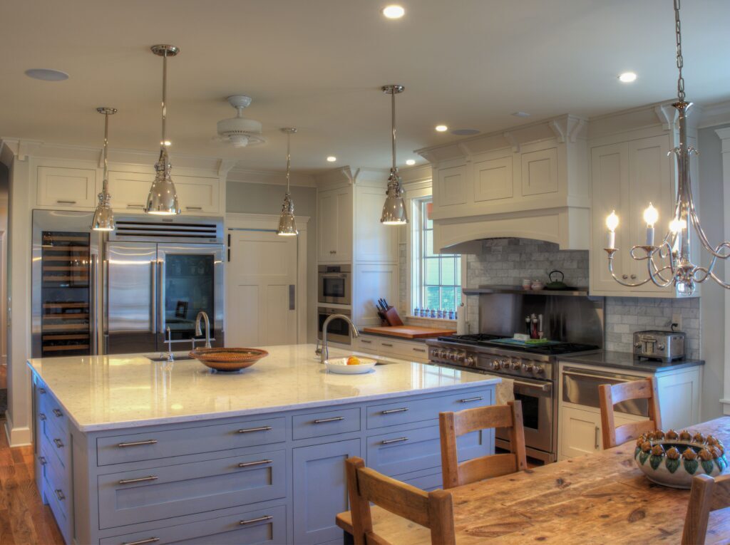 blue cabinetry for a kitchen with white countertops