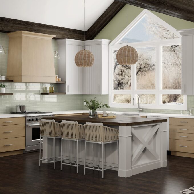 A white kitchen island in a kitchen
