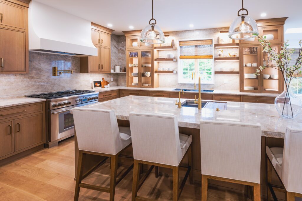 Three chairs in a kitchen with open shelves