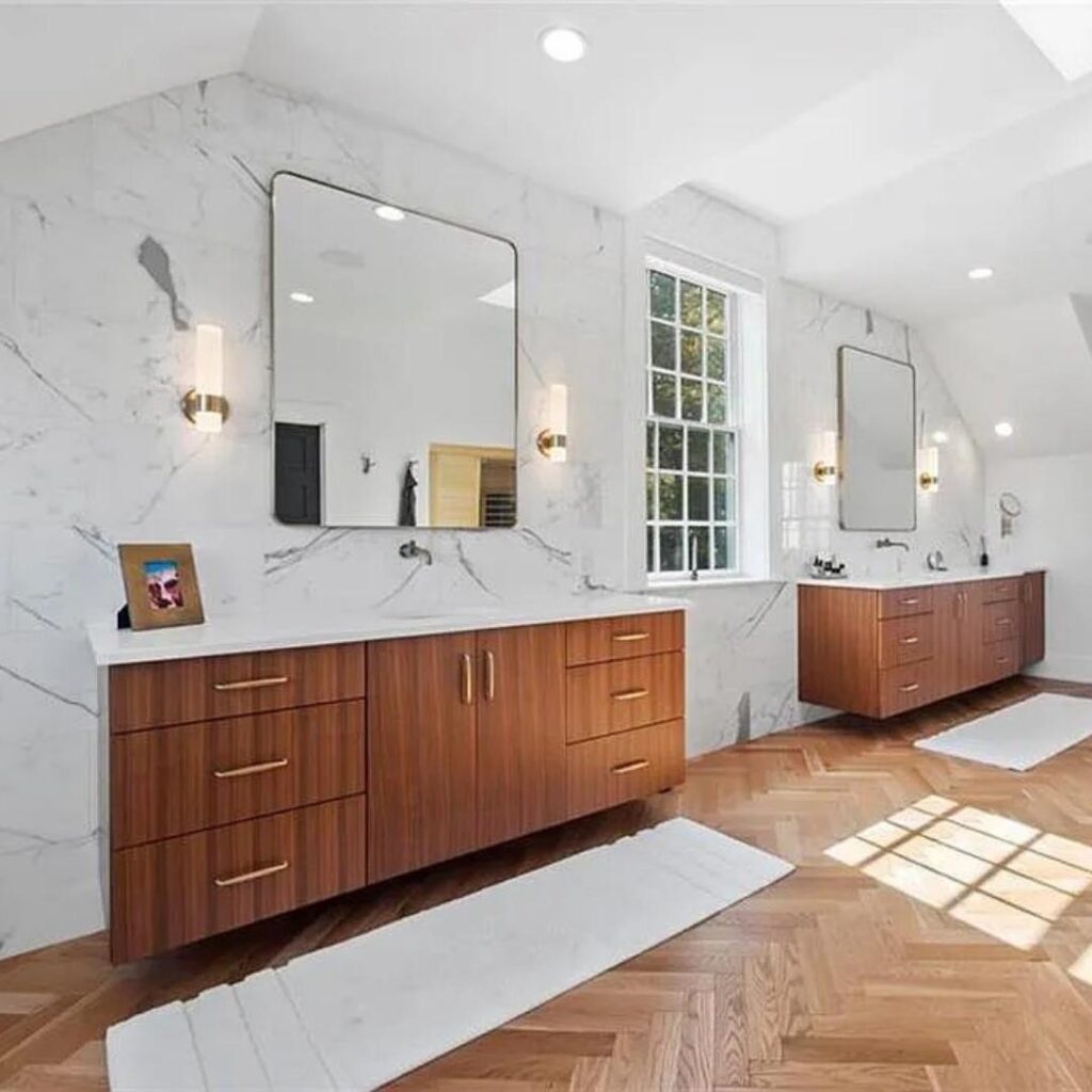 A bathroom with 2 floating vanities.