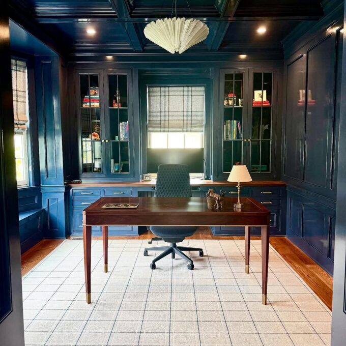 blue laquer cabinetry in a home office in Orefield pa. the walls and ceiling are drenched in blue gloss