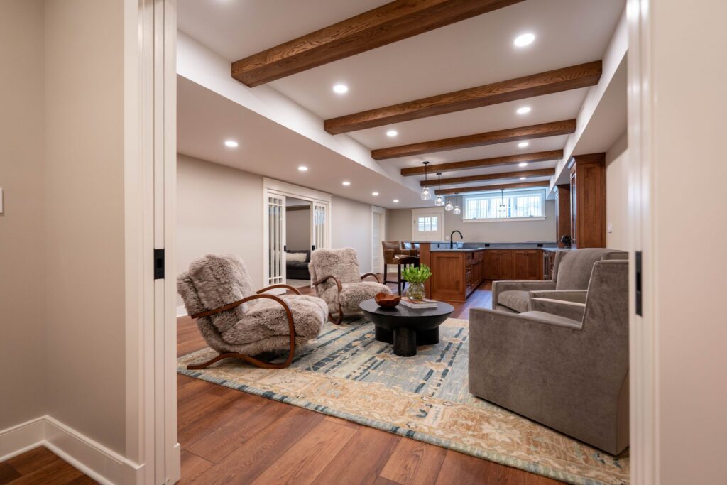 feature of ceiling beams in a basmeent bar by Laslo Custom Kitchens