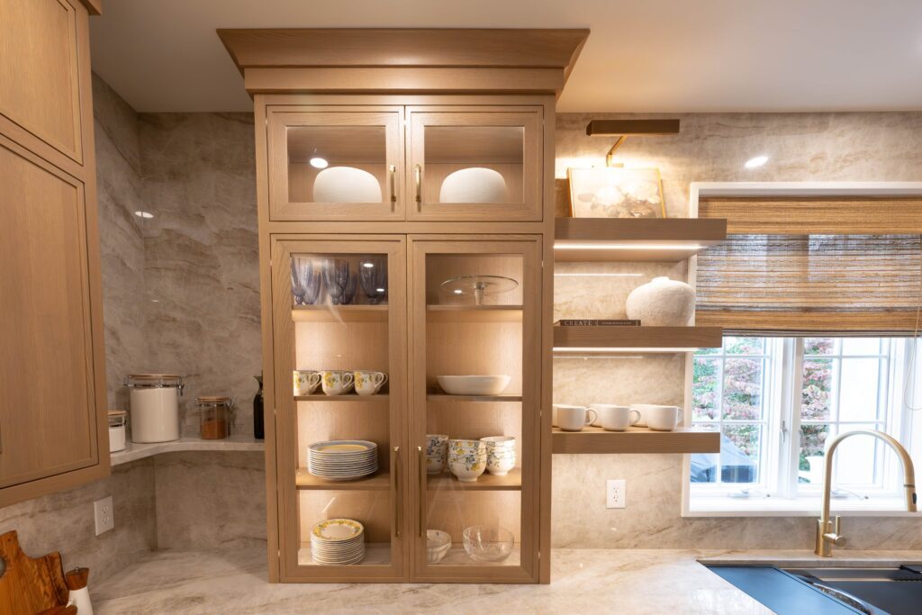Light brown kitchen cabinet display with lighting