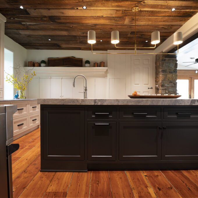 kitchen island in black in a farmhouse