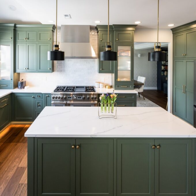 A beautifully crafted Macungie kitchen remodel showcasing a bespoke Galley workstation sink, a professional Thermador range, and elegant custom cabinetry.