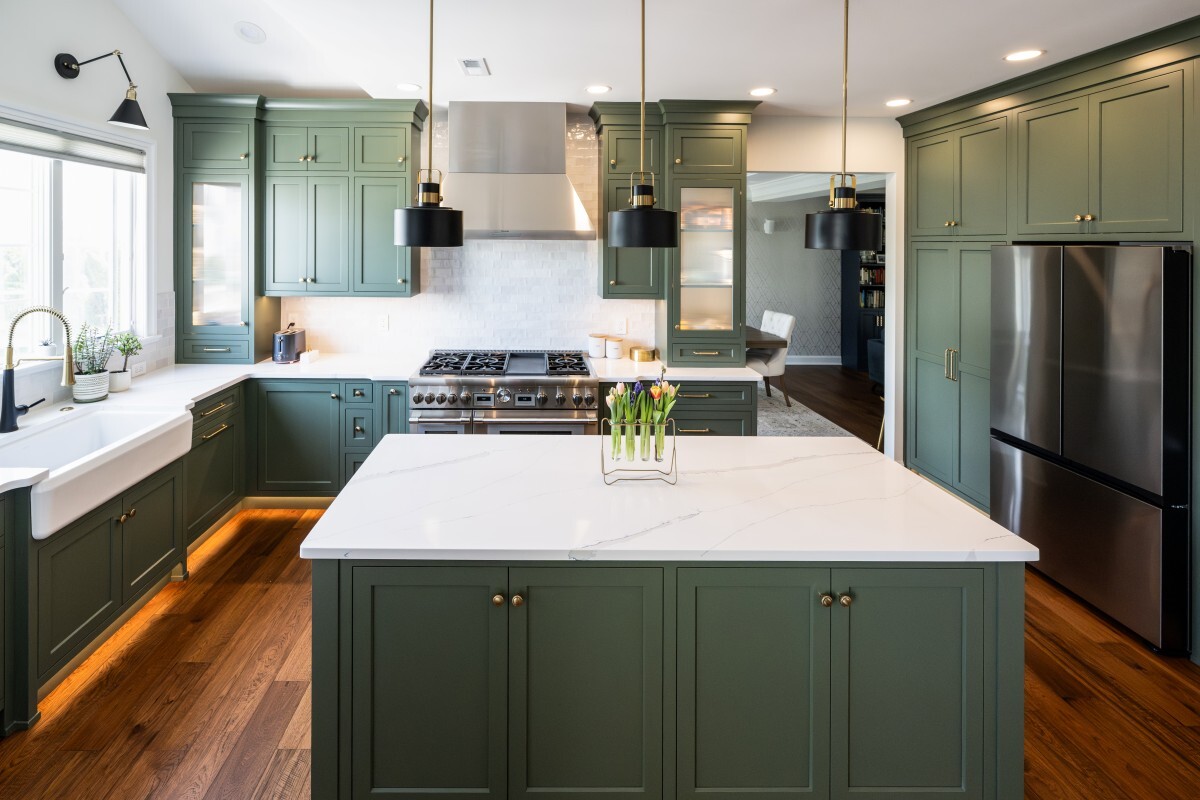A beautifully crafted Macungie kitchen remodel showcasing a bespoke Galley workstation sink, a professional Thermador range, and elegant custom cabinetry.