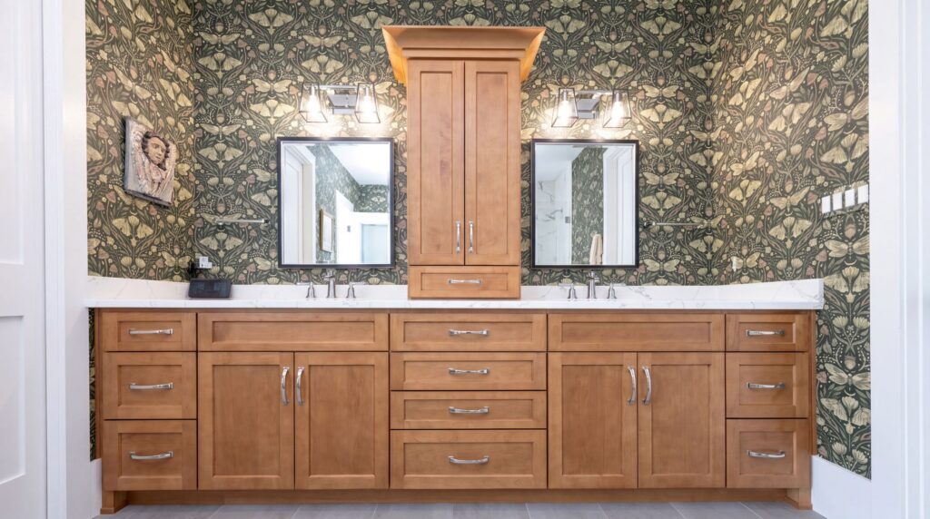 A view of the completed bathroom remodel in Bethlehem, PA featuring hard maple center tower cabinetry with custom millwork.