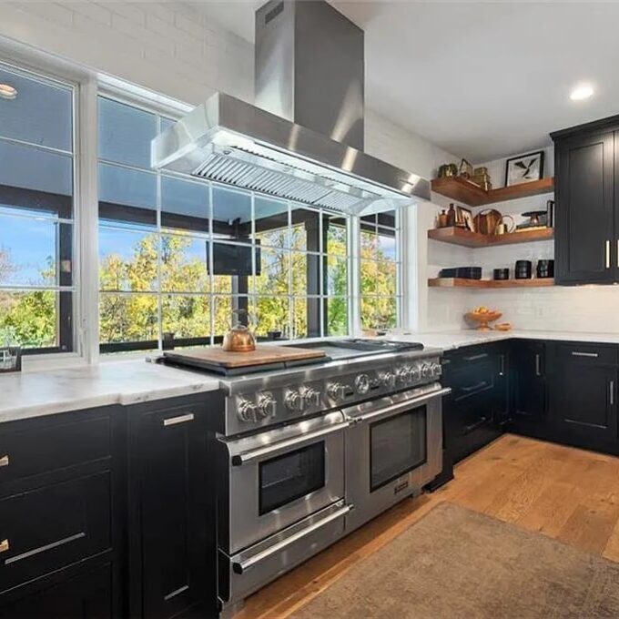 A stunning kitchen showcasing premium Coopersburg kitchen remodeling, featuring exquisite flush-inset custom cabinetry seamlessly integrated with high-end appliances.