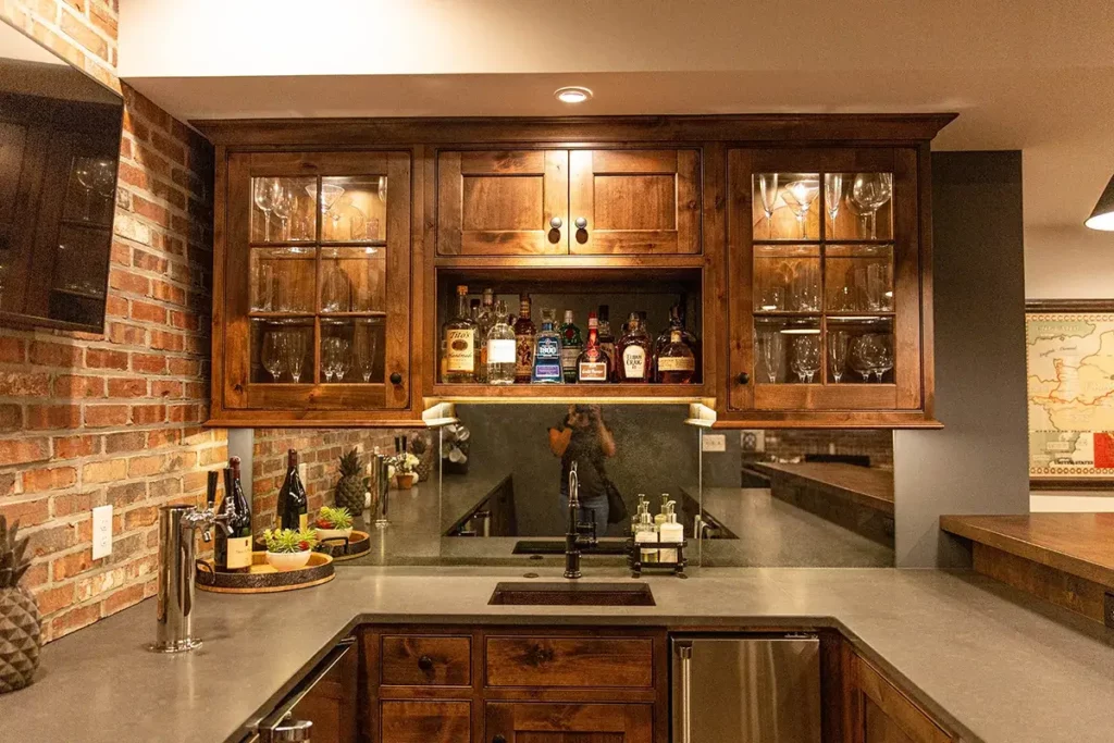A custom Rustic Bar with natural wood cabinets and beer keg tap